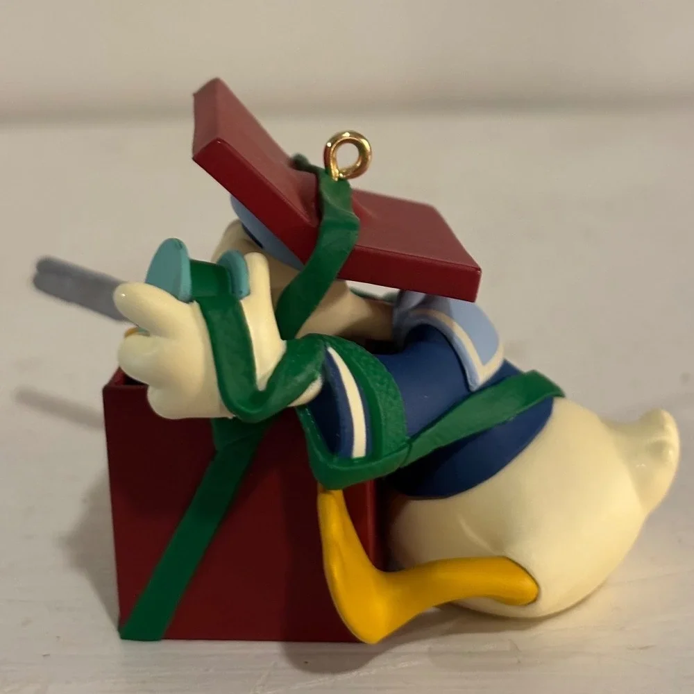 Hallmark Keepsake 1997 Donald's Surprising Gift Archives Series Ornament QXD4025